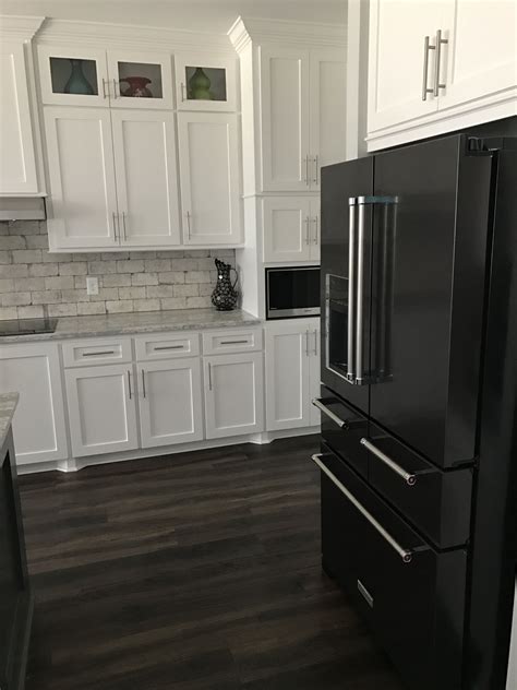 black cabinets with stainless steel appliances|white kitchen black stainless appliances.